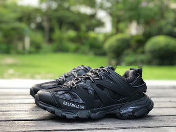 BALENCIAGA Track logo-detailed mesh and rubber sneakers